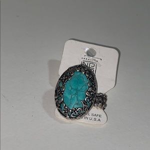 Turquoise fer de lis stretchable ring